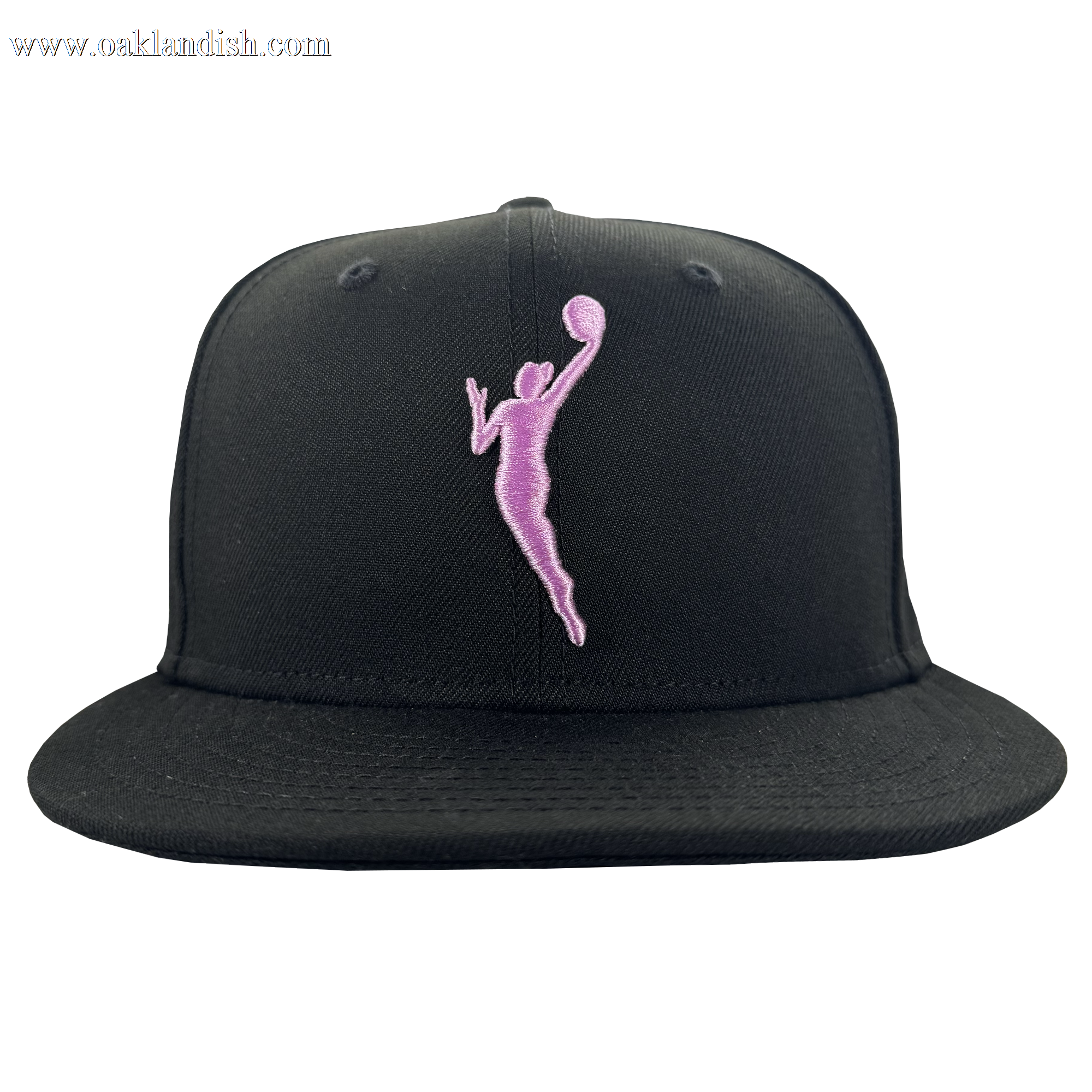 The GSV WNBA 9FIFTY Snapback is a black cap with a pink embroidered basketball player silhouette leaping with one arm raised, holding a ball, centered on the front panel. Background is plain white.
