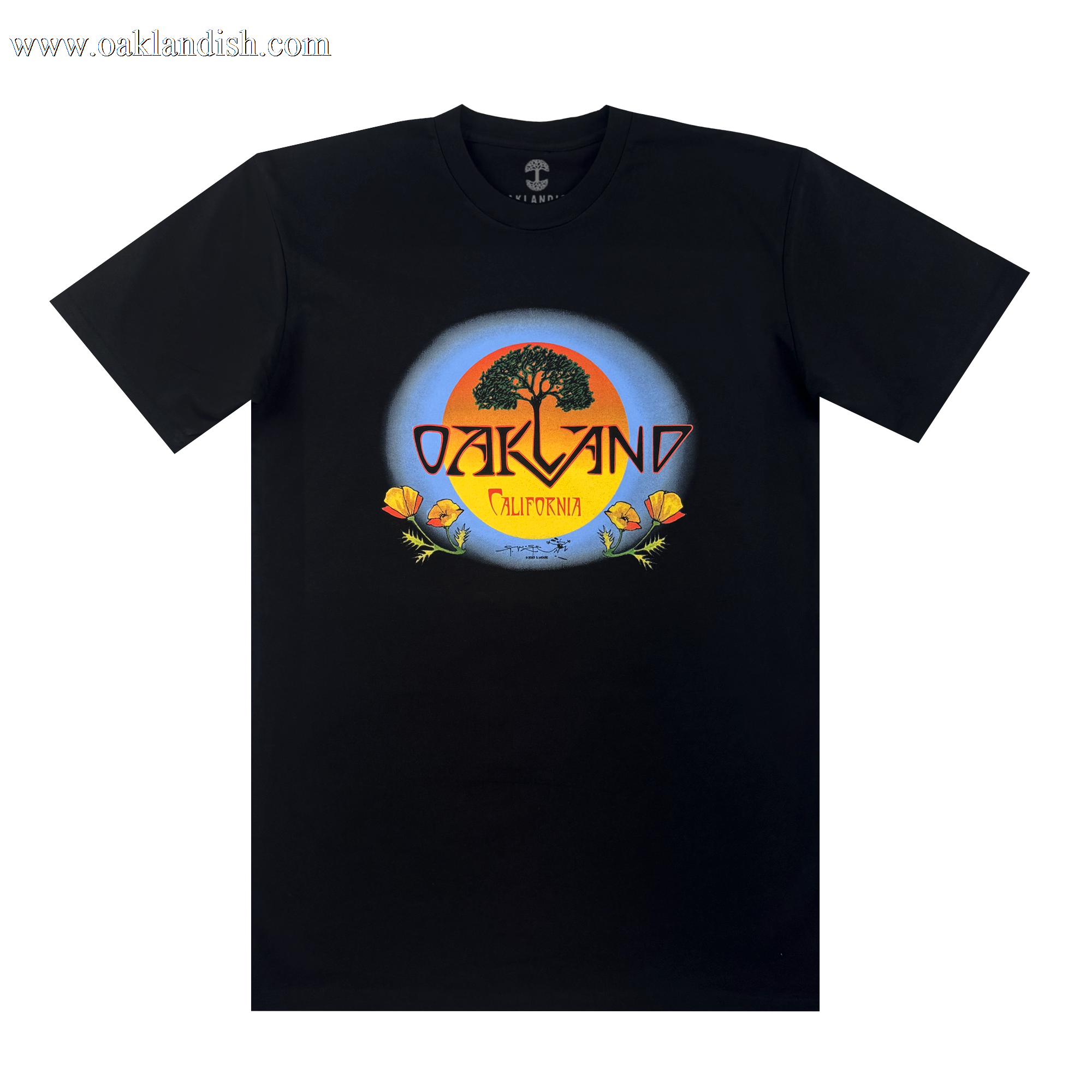 The Oaklandish Vanguard Tee features a classic fit and a Stanley Mouse-inspired graphic: a large tree silhouetted against an orange and blue sunset, with “OAKLAND” above “California” on a yellow banner, plus orange poppies and green leaves.