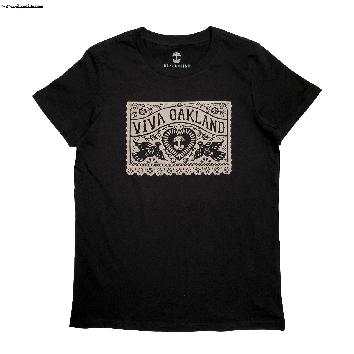 The Women's Viva Oakland Tee by Oaklandish is a black T-shirt made from 100% cotton, featuring a bold beige rectangular graphic with the words "Viva Oakland." Below the graphic, a heart rests amid artistic leaf and flower designs. This classic fit tee comes with the "Oaklandish" logo printed on the inside neckline.