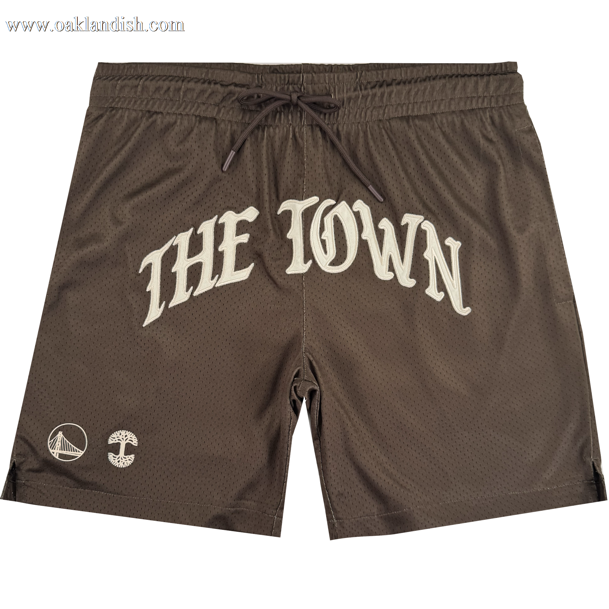 Arched Black-Letter Shorts by Other feature "THE TOWN" in bold white lettering across the front, taking inspiration from the iconic Warriors Town jersey. Near the left leg opening are two distinct logos: the Golden State Warriors bridge logo and a circular emblem. Designed with an elastic waistband and a black drawstring, these shorts are a standout piece from the exclusive Town Collection.